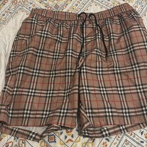 Gently used Burberry swimming trunks.